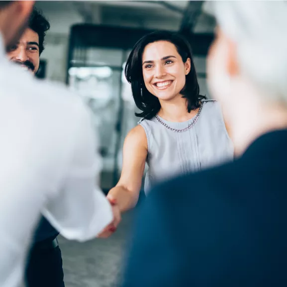 women-handshaking.png