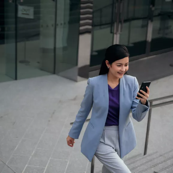 A woman looking at her phone.