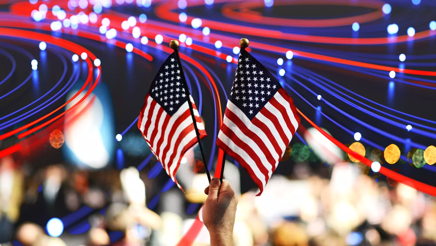 Hand holding two American flags with connectivity nodes 