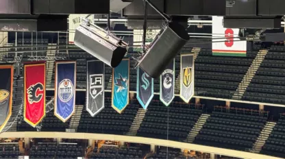 Team banners hanging in a sports arena